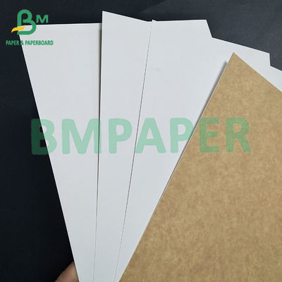 Papel de cartón revestido con recubrimiento de Kraft en el fondo Blanco Frente revestido con recubrimiento de Kraft en el fondo Rollos de papel de cartón para embalajes de bebidas enlatadas