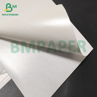 80g 130g Papel de pegatina blanco brillante con pegamento de fusión en caliente Papel de fondo blanco